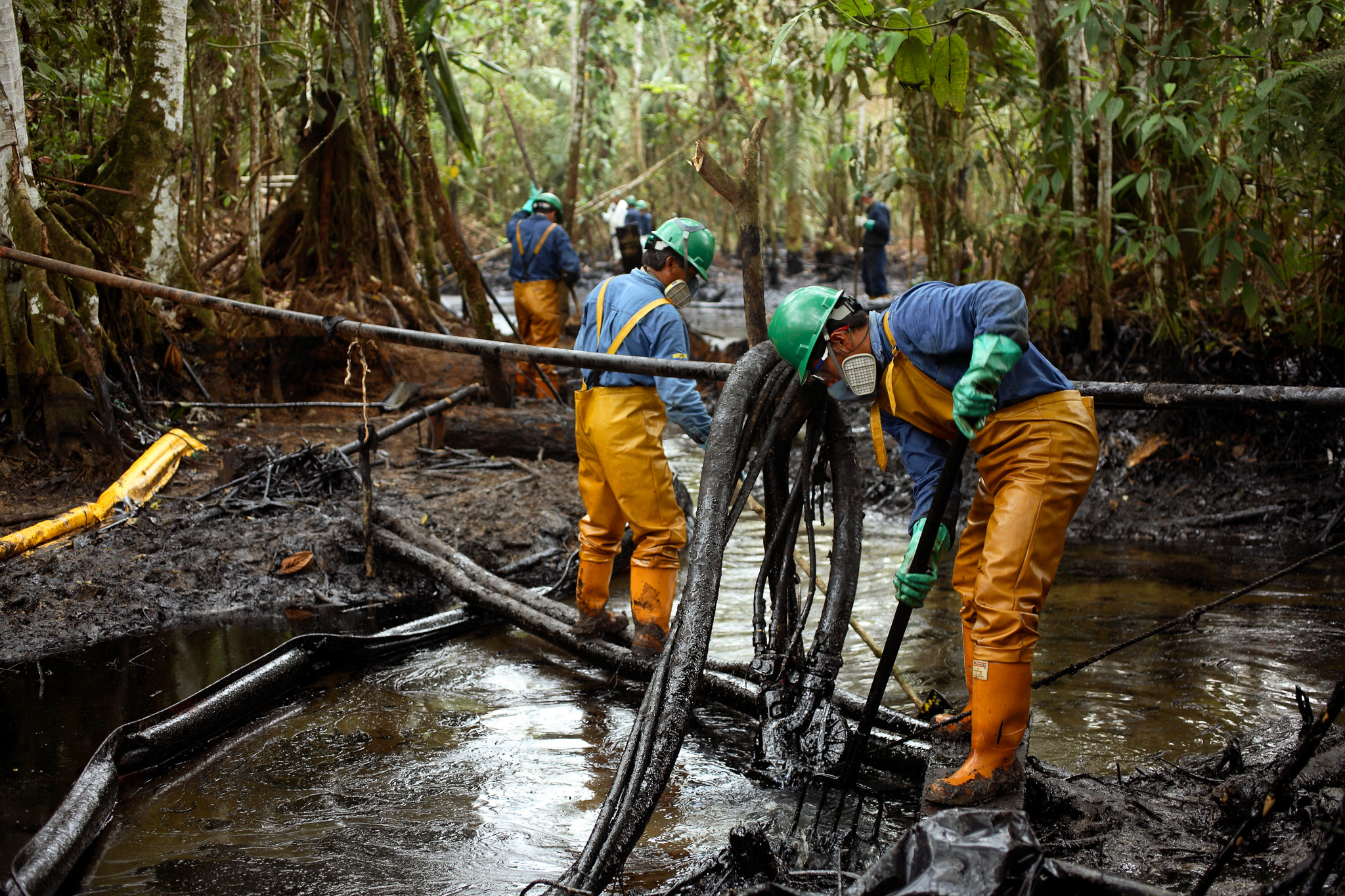 Cleaning up an oil spill in the Amazon rainforest