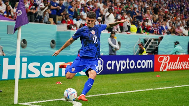 Christian Pulisic #10 of the United States takes a cornerkick during a FIFA World Cup Qatar 2022 Group B match between England and USMNT at Al Bayt Stadium on November 25, 2022 in Al Khor, Qatar.