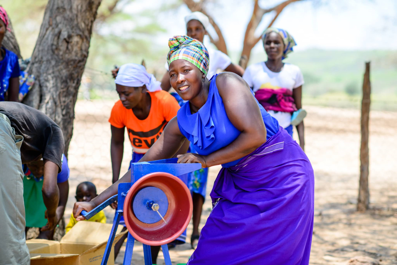 Akashinga Binga Community making peanut butter. IAPF initiative. Image credit: courtesy of Adrian Steirn