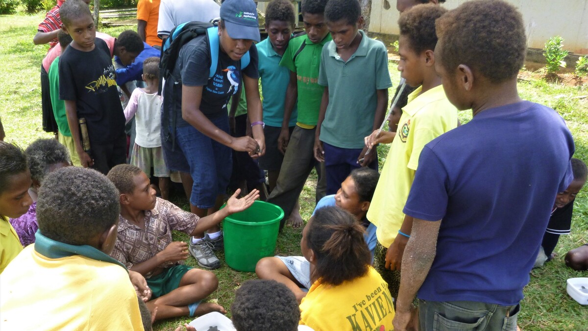 Yolarnie Amepou with elementary students at Kikori for hatching activities. Image credit: Courtesy of Piku Biodiversity Network