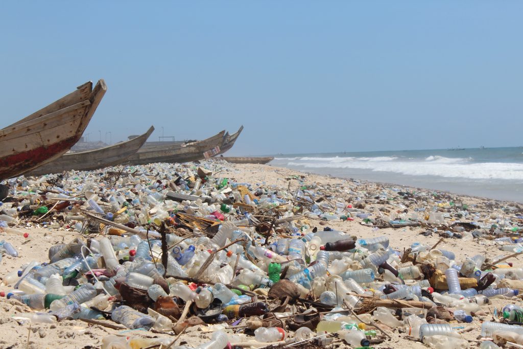 Plastic waste accumulates along Ghana’s coastline, where ocean currents and urban runoff carry discarded bags and bottles to the shore. Image Credit: GlobalIssues.org. Plastic waste accumulates along Ghana’s coastline, where ocean currents and urban runoff carry discarded bags and bottles to the shore. Image Credit: GlobalIssues.org.