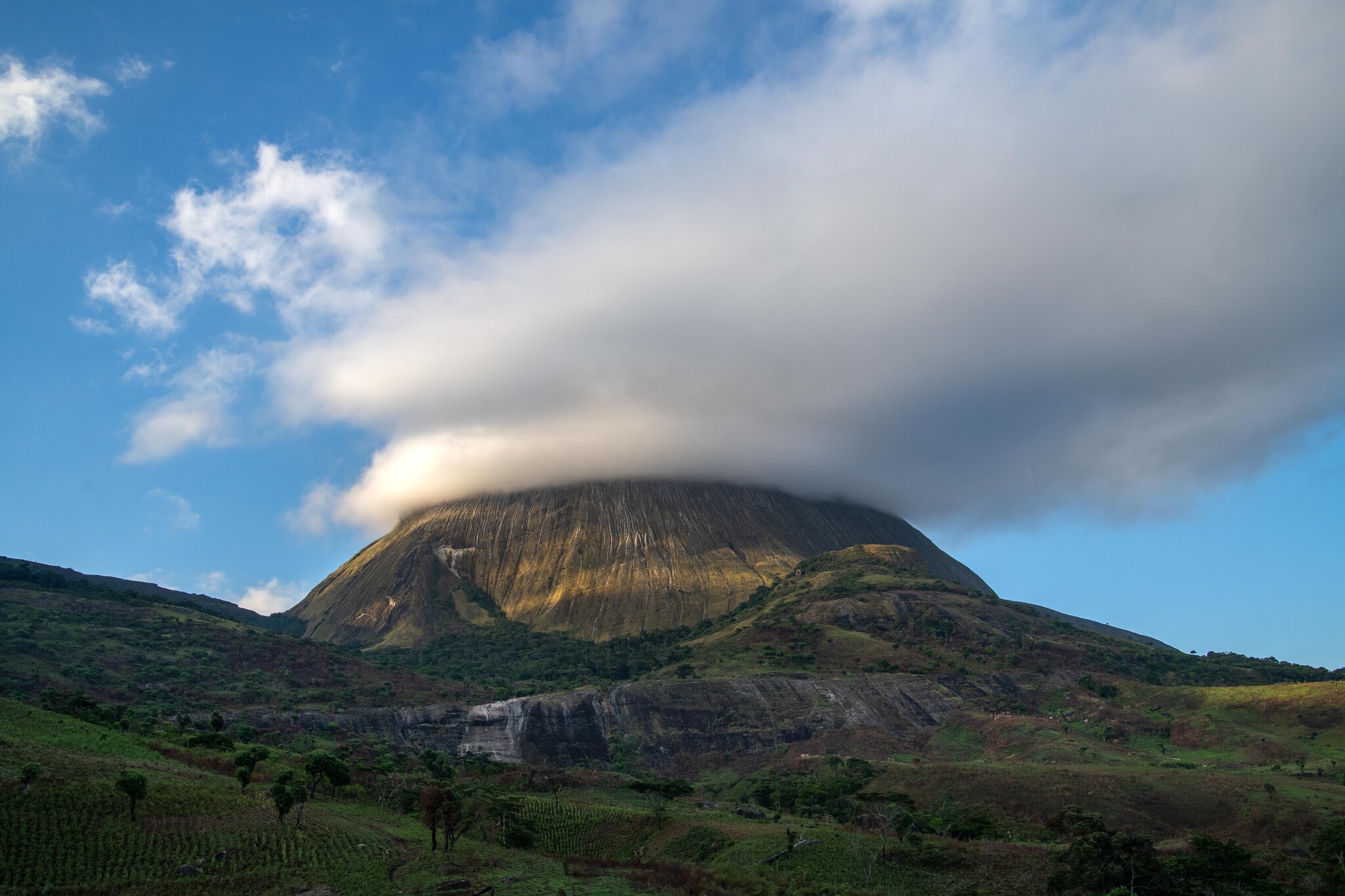 The Namuli mountain range captures rain clouds and creates perfect conditions for its communities to farm almost all year round. Photo by Roshni Lodhia/Legado