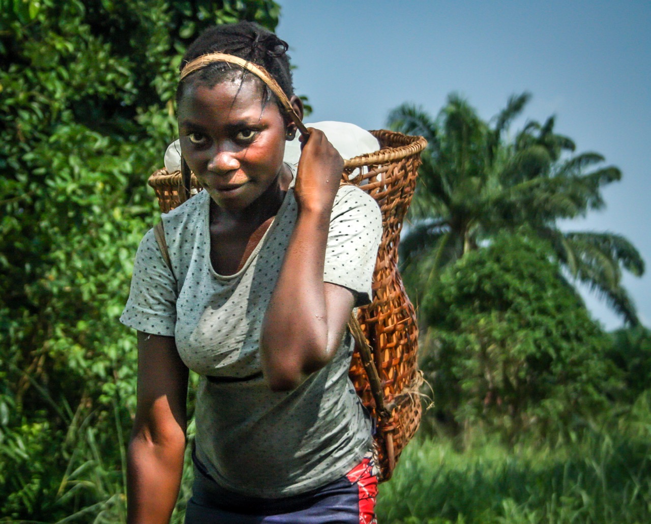 Woman carrying water (c) Pappy Orion