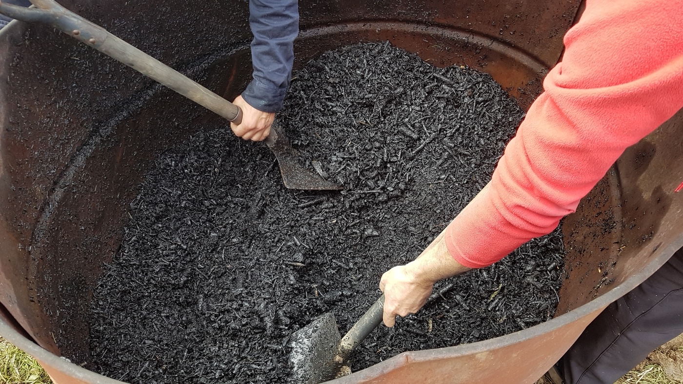 Preparing biochar for use in the vegetable garden.