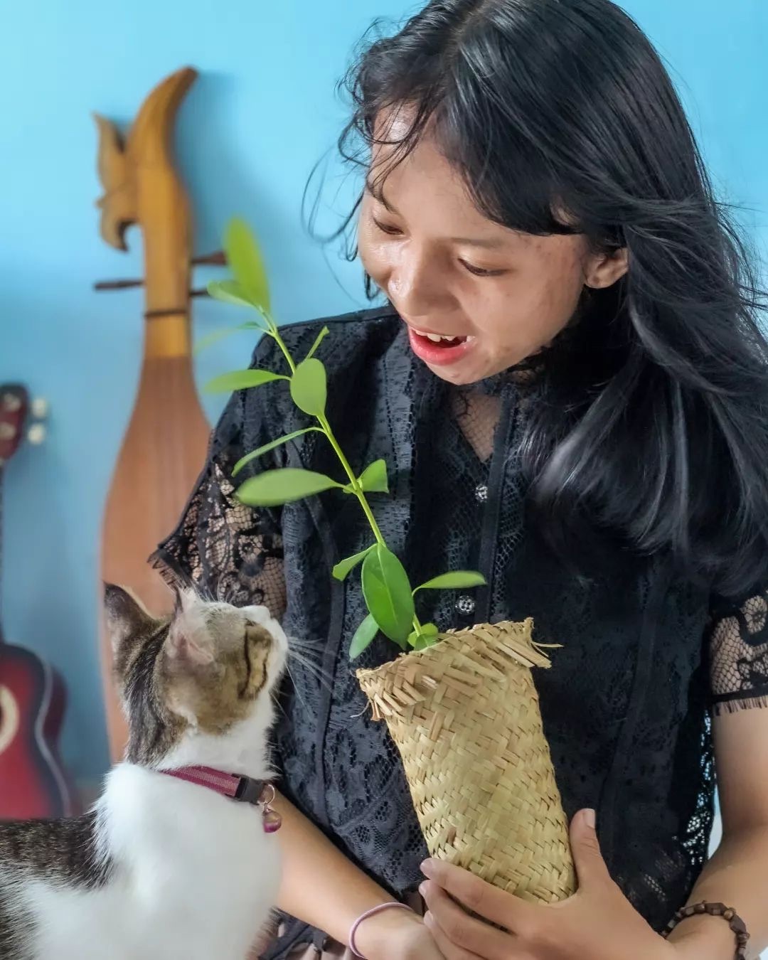 Sumarni Laman with her cat.
