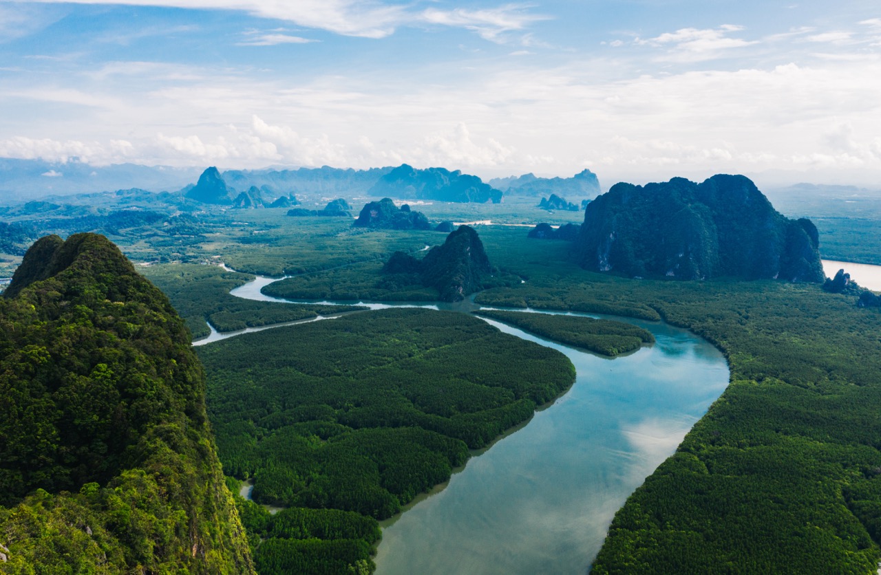 Aerial scenery view of mangroves forest, river canals and mountains. Ao Phang Nga bay National Park, Thailand By BullRun