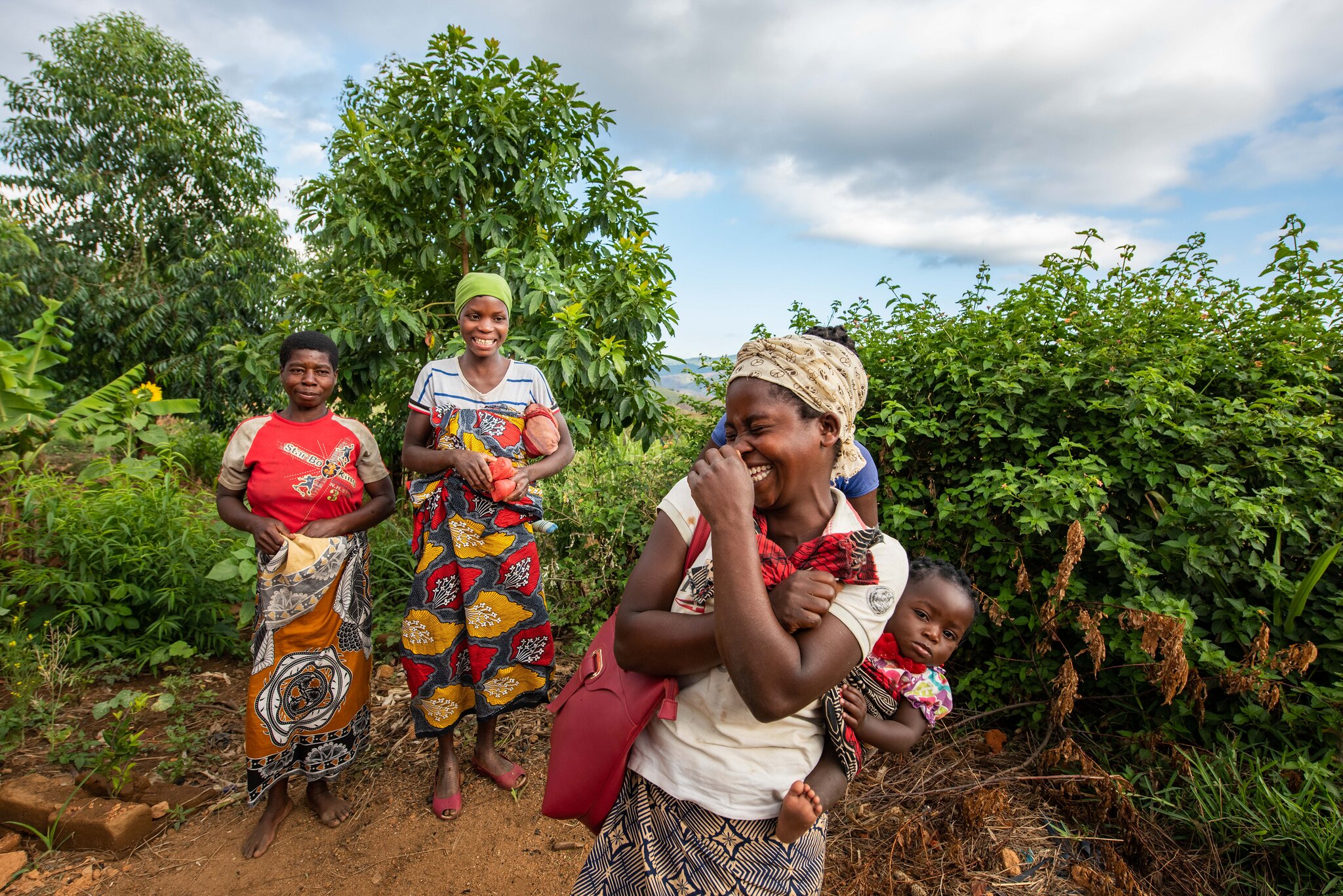 A woman's group in Mucunha, showcasing one of the key ways we create women-led spaces inside of our program to increase their leadership and voice. Photo by Roshni Lodhia/Legado