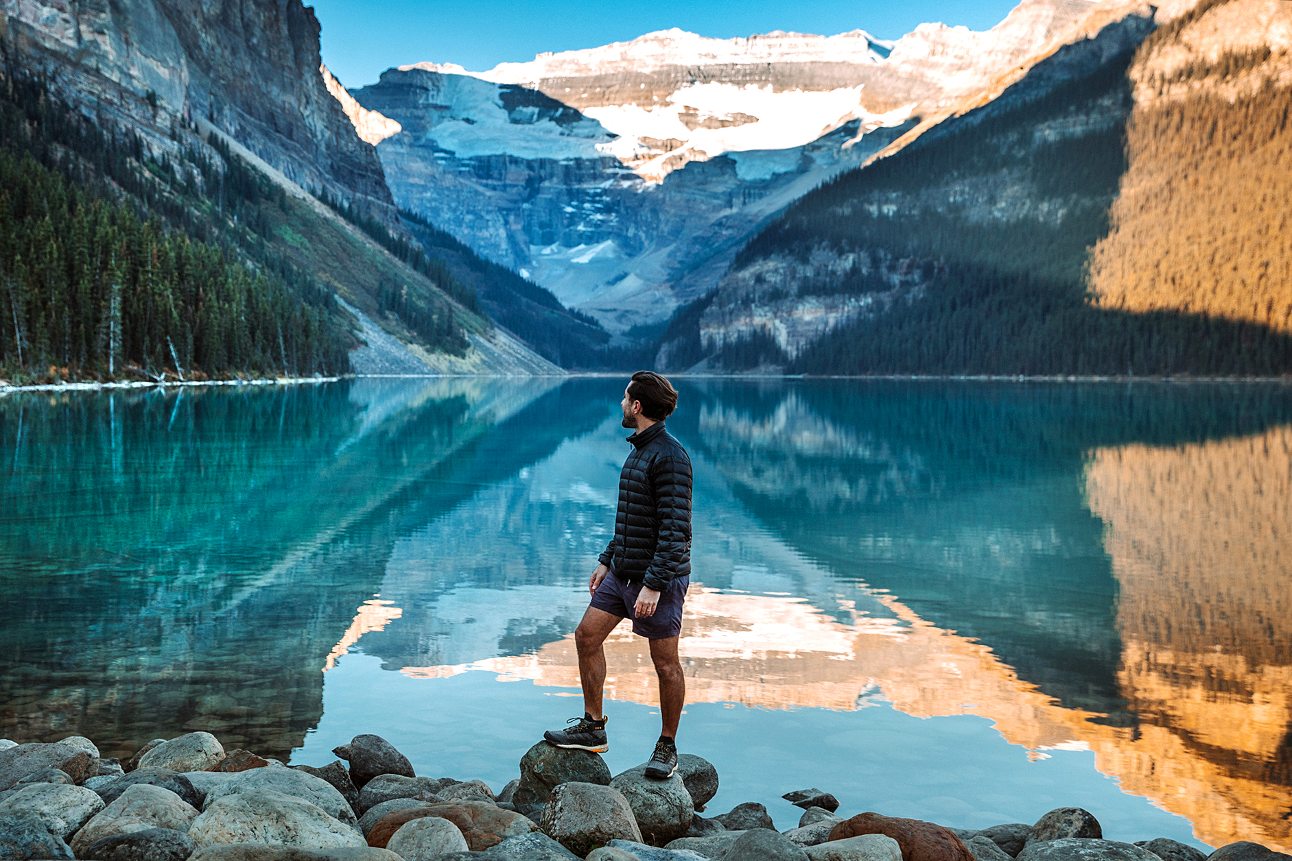 Picture/Photo: Woman fishing in Emerald Lake, sunset. Yoho National Park,  Canadian Rockies, British Columbia, Canada