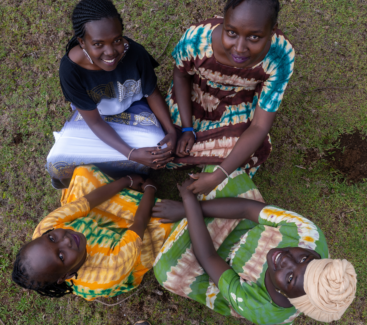 Ogiek women sitting in a circle. Image credit: Courtesy of Digital Democracy