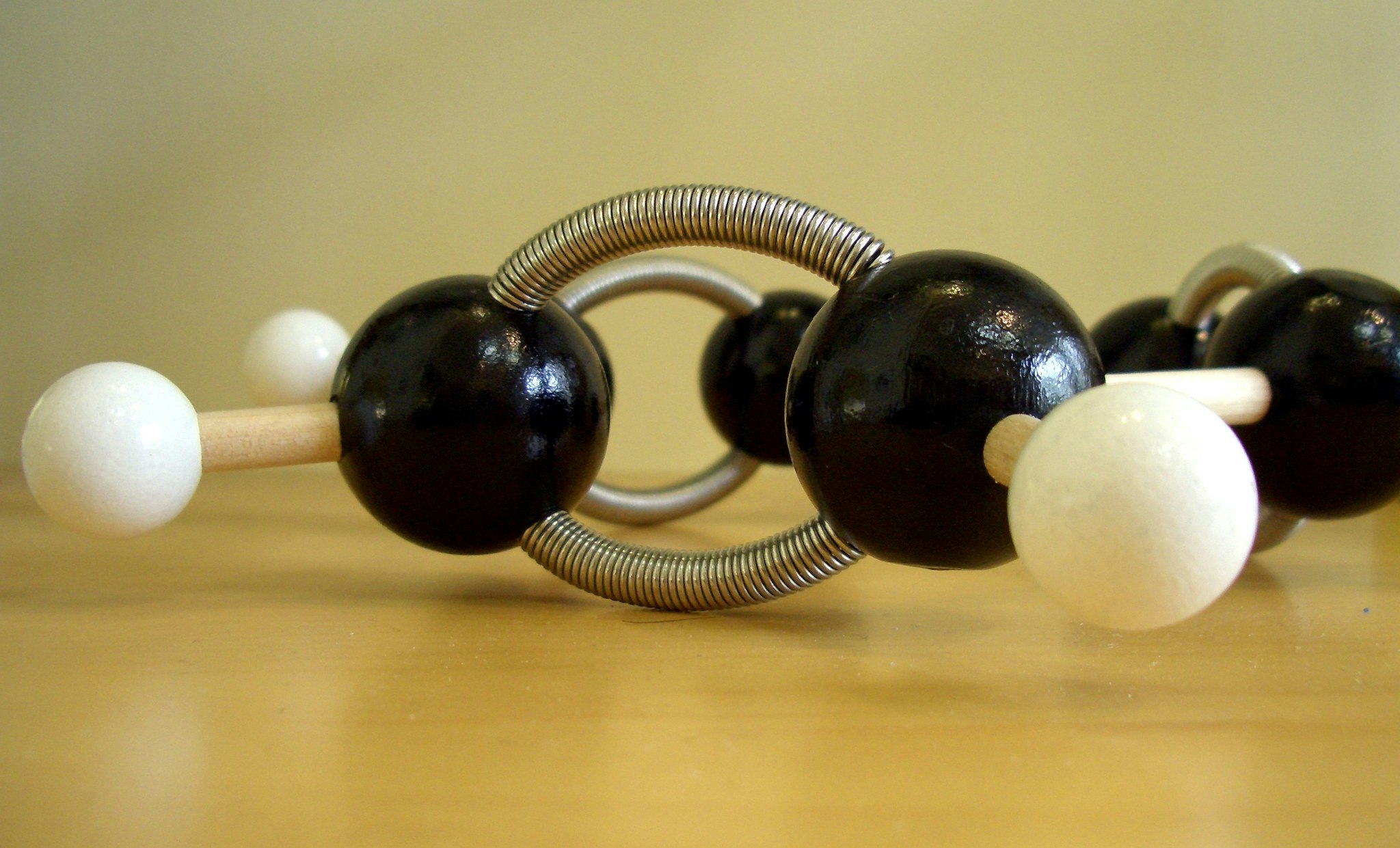 a black and white molecular model made of plastic
