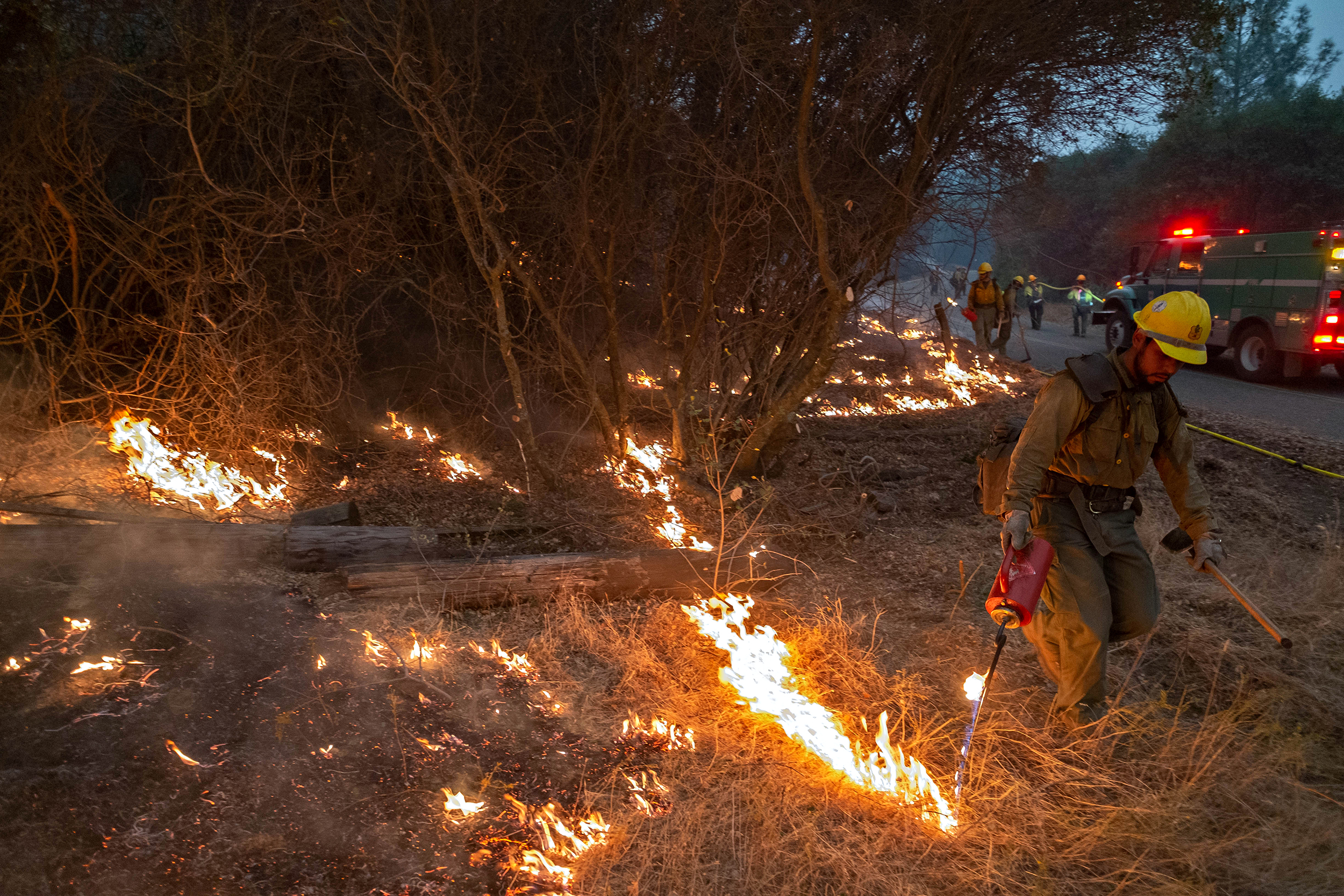 The Springville Hotshots brought fire down a dozer line and tied into Road 81 just north of the Mammoth Pools Trailer Park in the evening of September 10, 2020 as efforts continue to contain the Creek Fire on the Sierra National Forest.