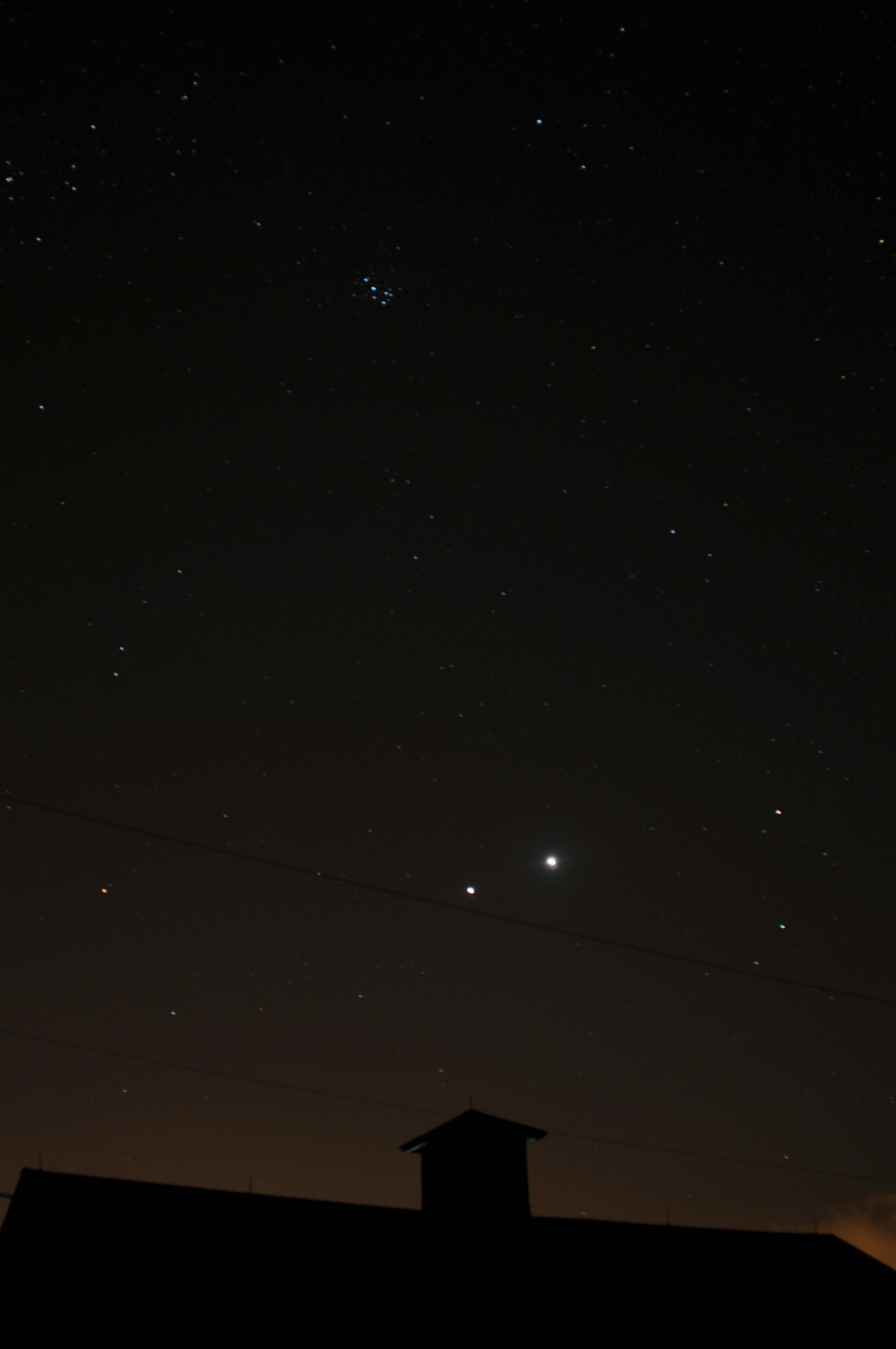 A picture of the night sky, showing Venus and Jupiter in conjunction, and the Little Dipper at the top.