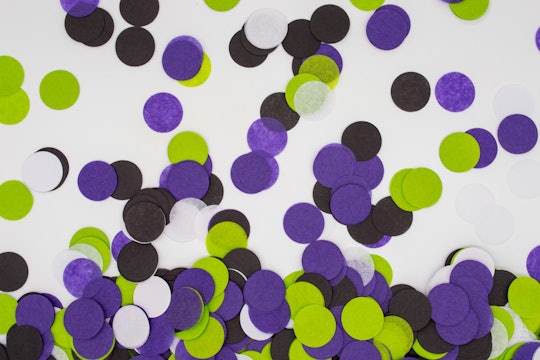 a collection of black, purple, and green circles