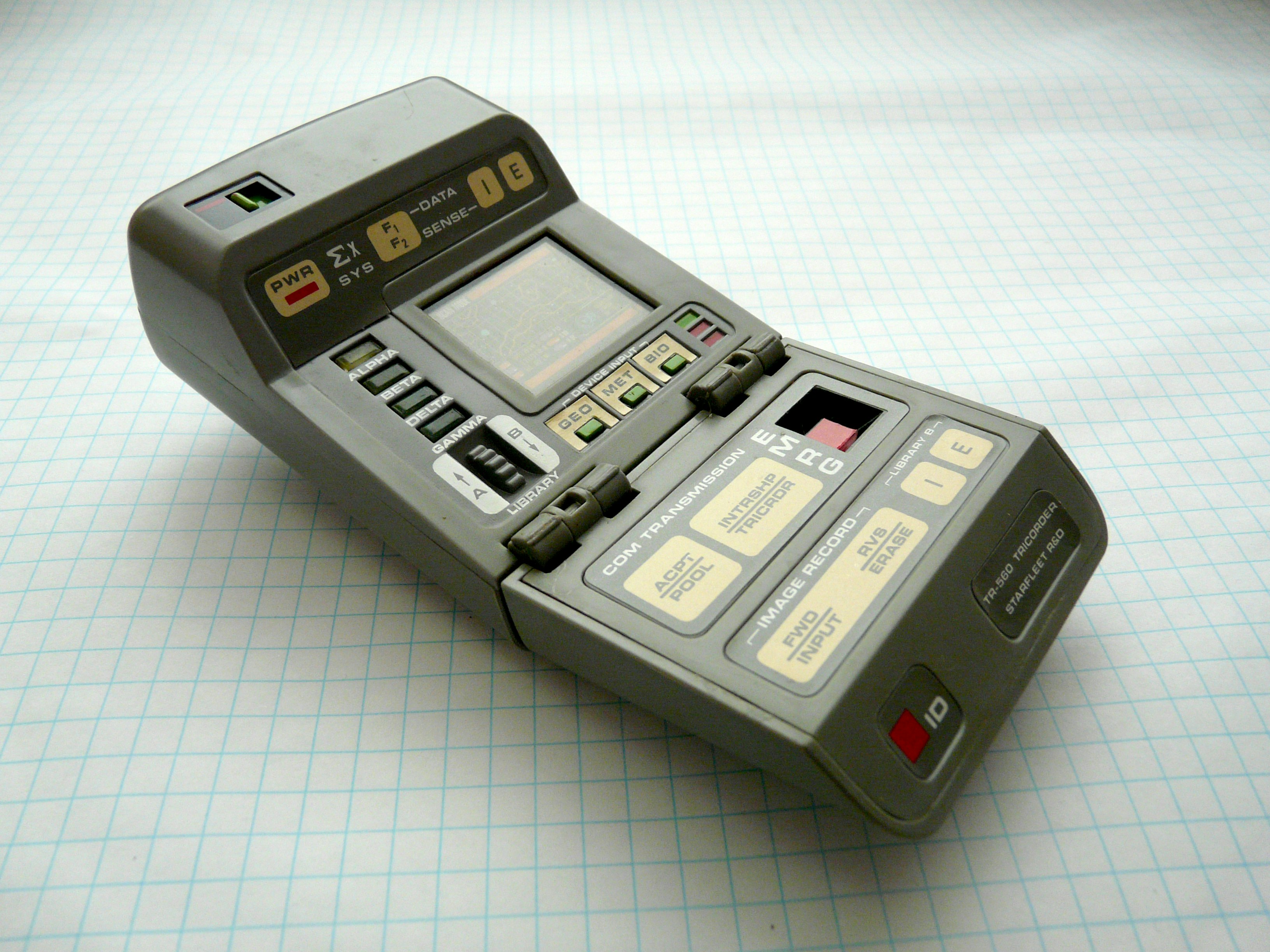 green electronic tricorder