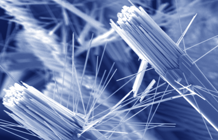 blue and white microscope image of nanowires, which look like uncooked spaghetti