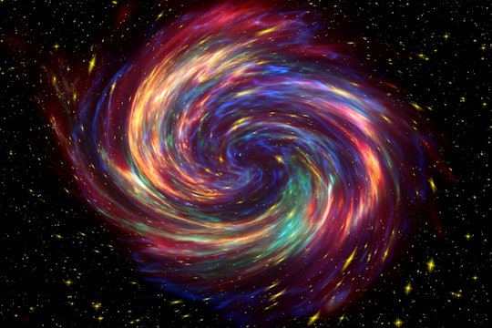 a rainbow colored supernova against a dark background