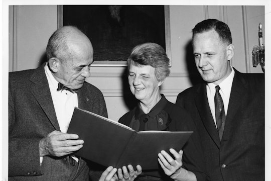 Walter Bauer, Rebecca Lancefield, and Macyln McCarty. Lancefield is receiving the T. Duckett Jones Memorial Award in October 1960.