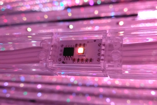 purple spotted lights with a circuit board