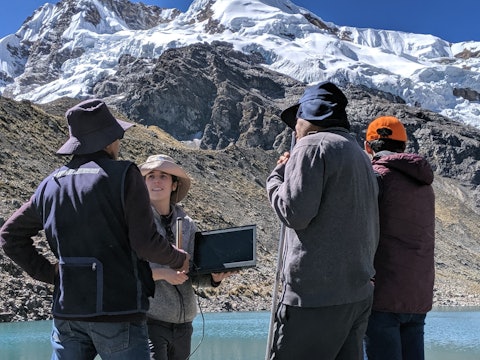 Somers teaching water professionals in Huancayo about measuring glacial lake water levels