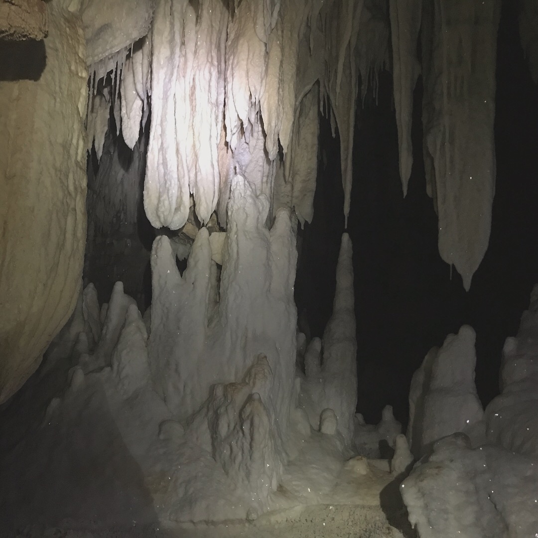 Stalactites and stalagmites in a cave.