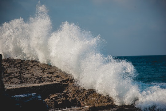 wave crash ocean shore water