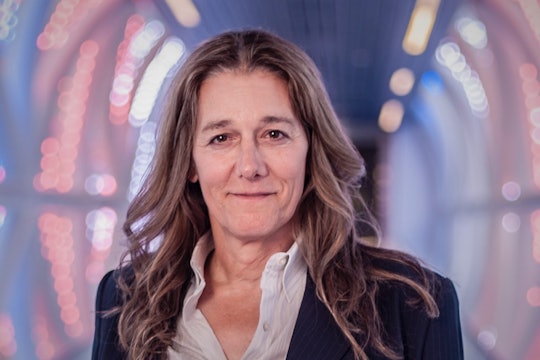 A headshot of Martine Rothblatt, a woman with shoulder-length brown hair, wearing a white shirt and a navy jacket.
