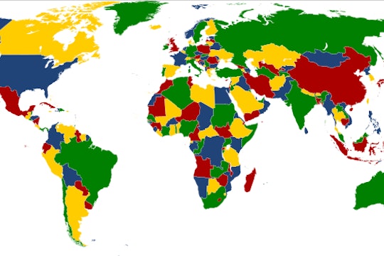 a world map with countries colored in just four colors: red, blue, yellow, green