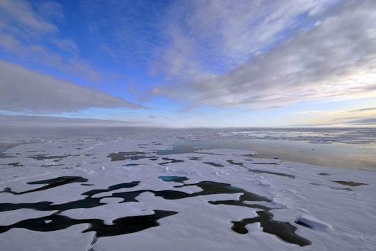arctic landscape clouds over the snow-covered ocean