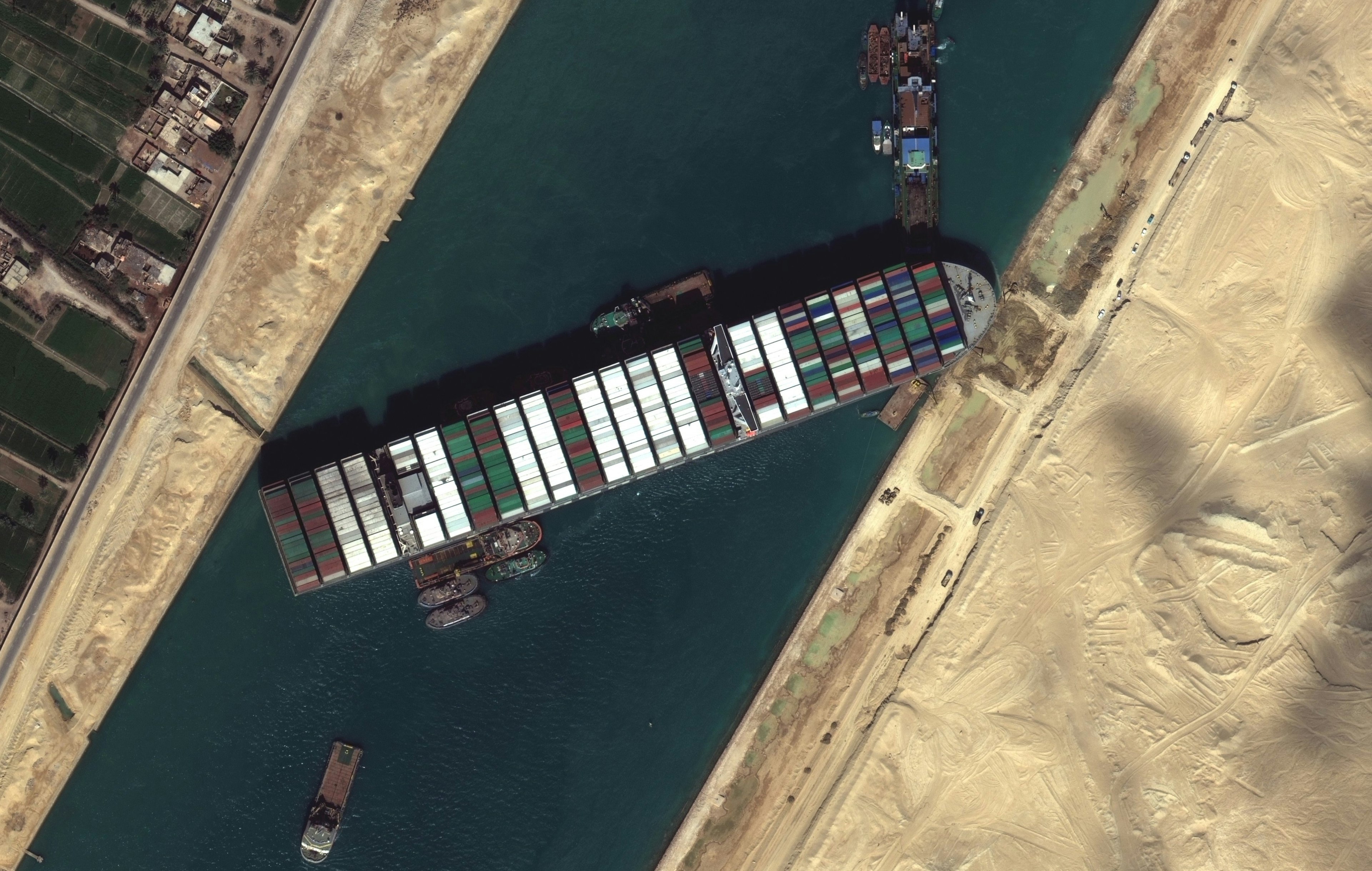 A satellite image of the Ever Given plugging the Suez Canal
