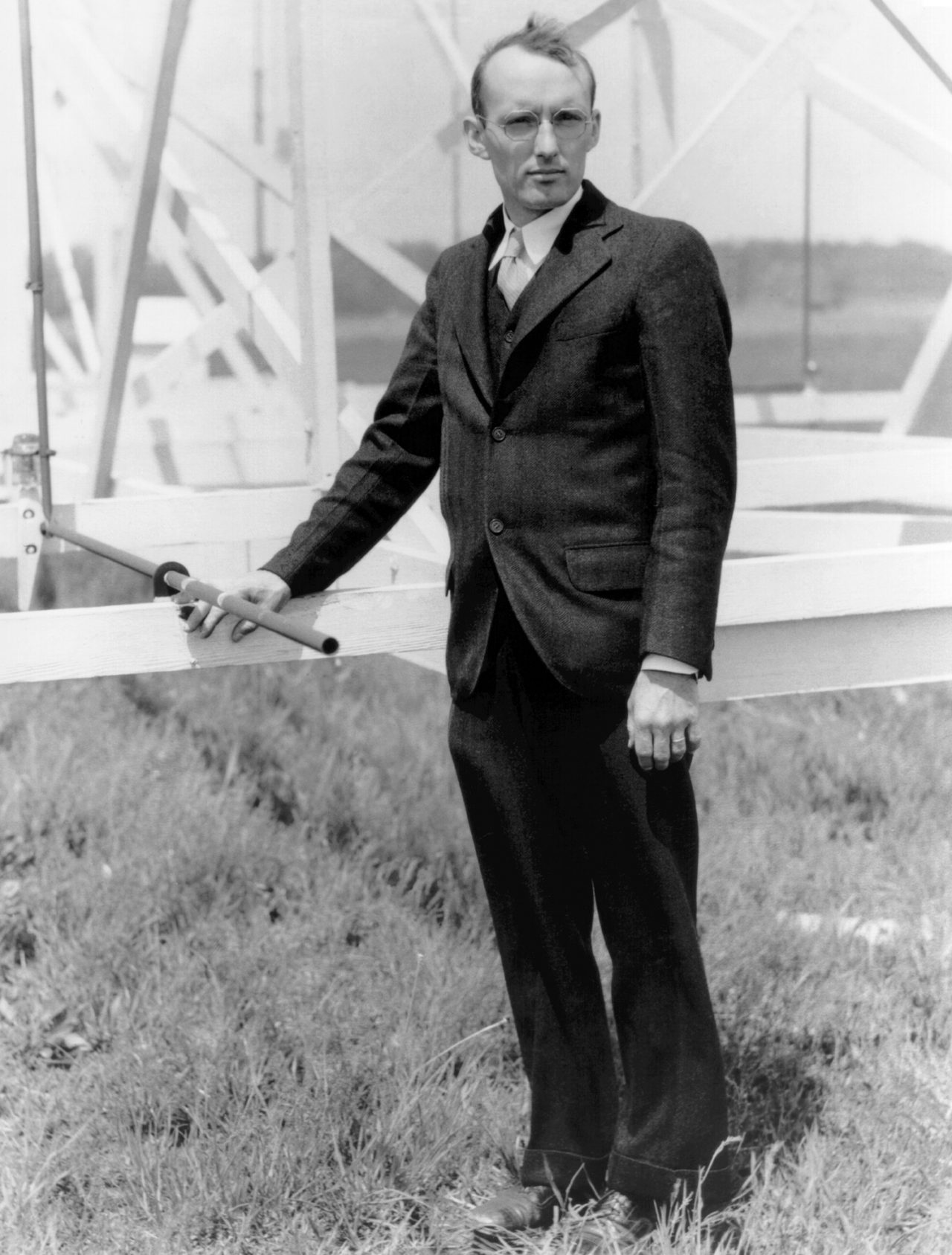 Jansky standing with the antenna he used to hunt down the origin of the mysterious radio hiss