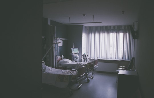 a hospital room in gray tones