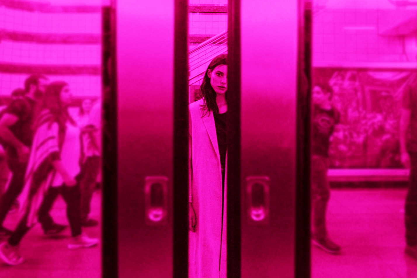 Woman behind closing subway doors