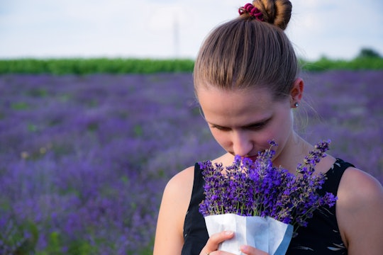 Woman smelling lavender