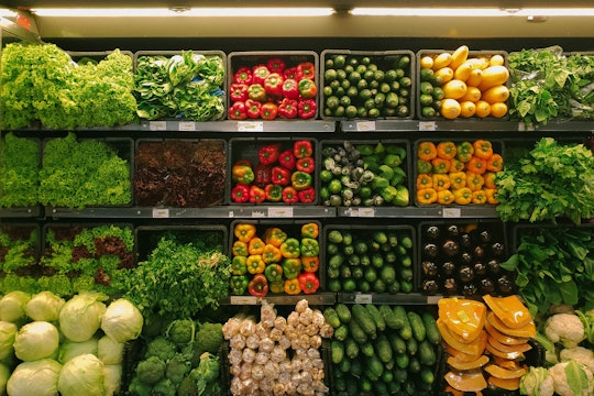 vegetables grocery store shelves full of vegetables
