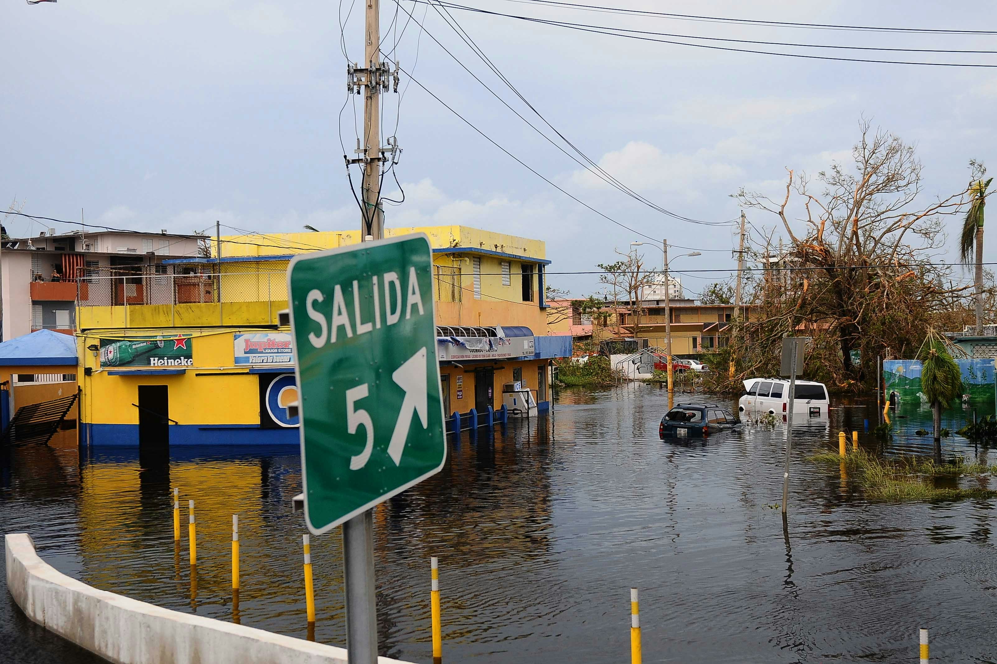 Flooded streets in a town in PR in the aftermath of Hurricane Maria