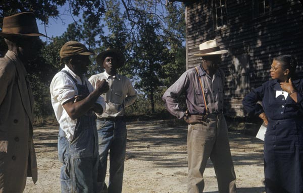 Human test subjects from the Tuskegee Syphilis Study talking with a study coordinator, Nurse Eunice Rivers