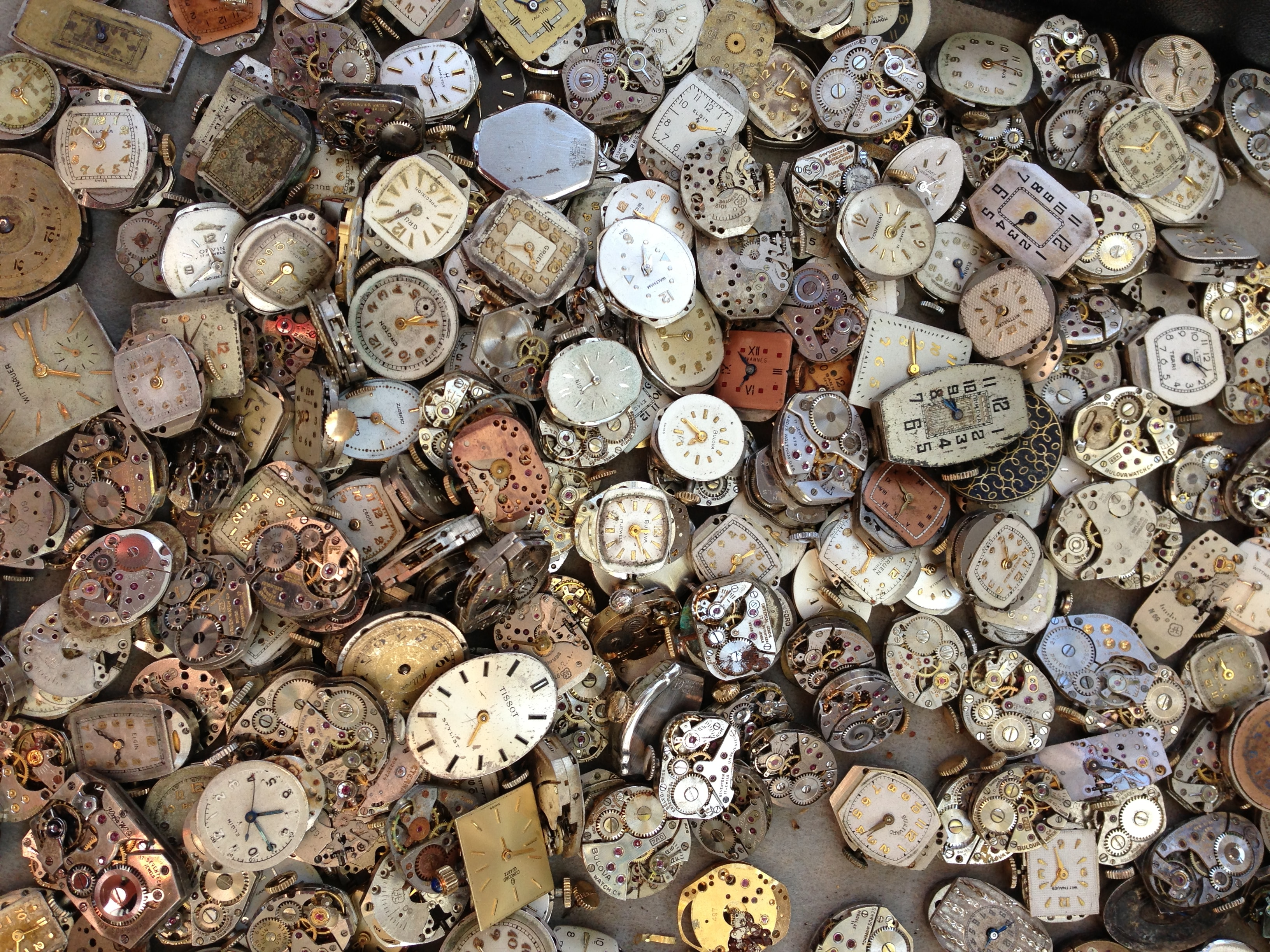 A watchmaker's discard pile of old watches.