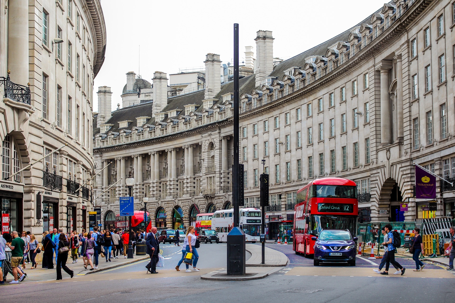 a photo from the streets of london featuring a red double decker bus