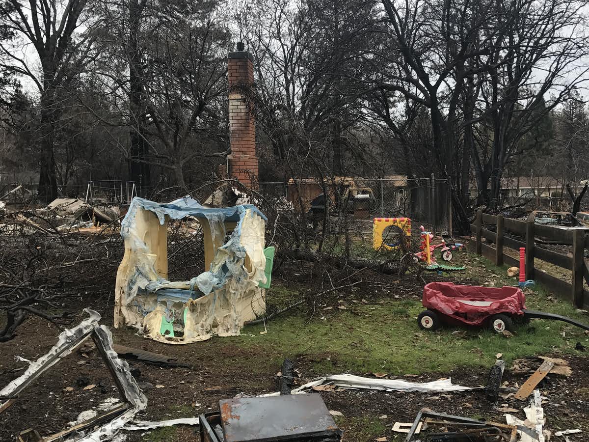 Plastic toys left behind in a yard to melt in a wildfire