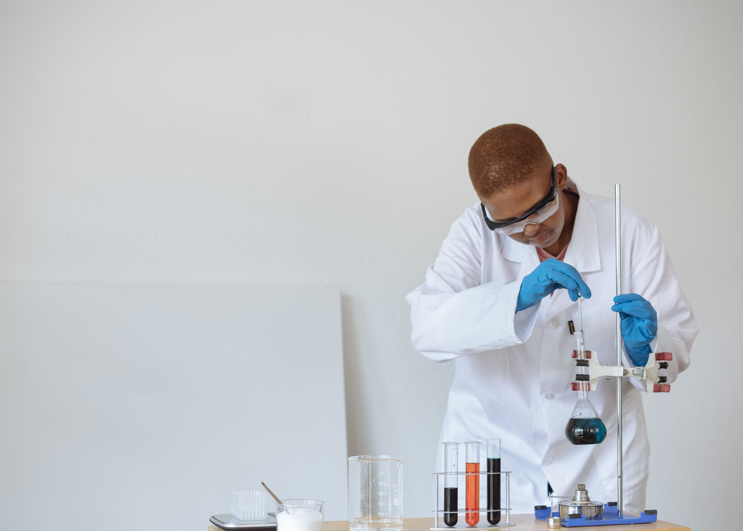 a black chemistry student running an experiment (#BlackInChem)