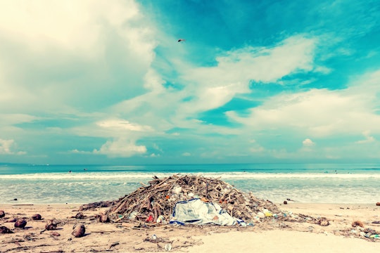 ocean trash mound of sand and garbage