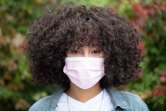 Black woman wearing a face mask