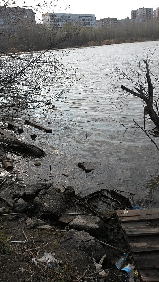 A river side with garbage and environmental contamination 