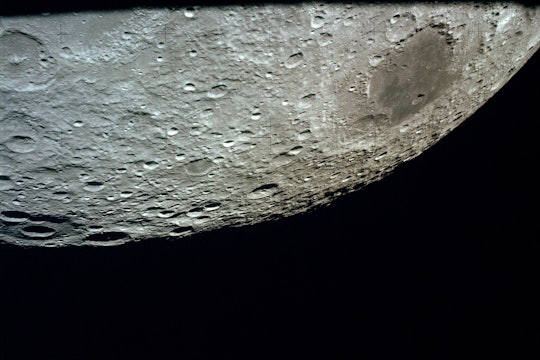 This oblique view of the lunar farside was photographed from the Apollo 13 spacecraft as it passed around the moon on its hazardous journey home. The large conspicuous mare area is Mare Moscoviense which is located at 146 degrees east longitude and 25 degrees north latitude. The large crater at the horizon is International Astronomical Union Crater No. 221. This view is looking northeast from the spacecraft.