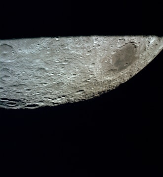 This oblique view of the lunar farside was photographed from the Apollo 13 spacecraft as it passed around the moon on its hazardous journey home. The large conspicuous mare area is Mare Moscoviense which is located at 146 degrees east longitude and 25 degrees north latitude. The large crater at the horizon is International Astronomical Union Crater No. 221. This view is looking northeast from the spacecraft.