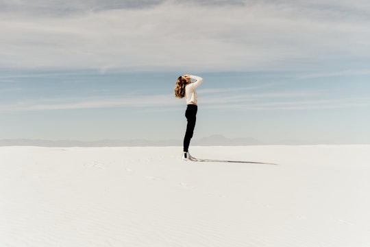woman thinking on beach