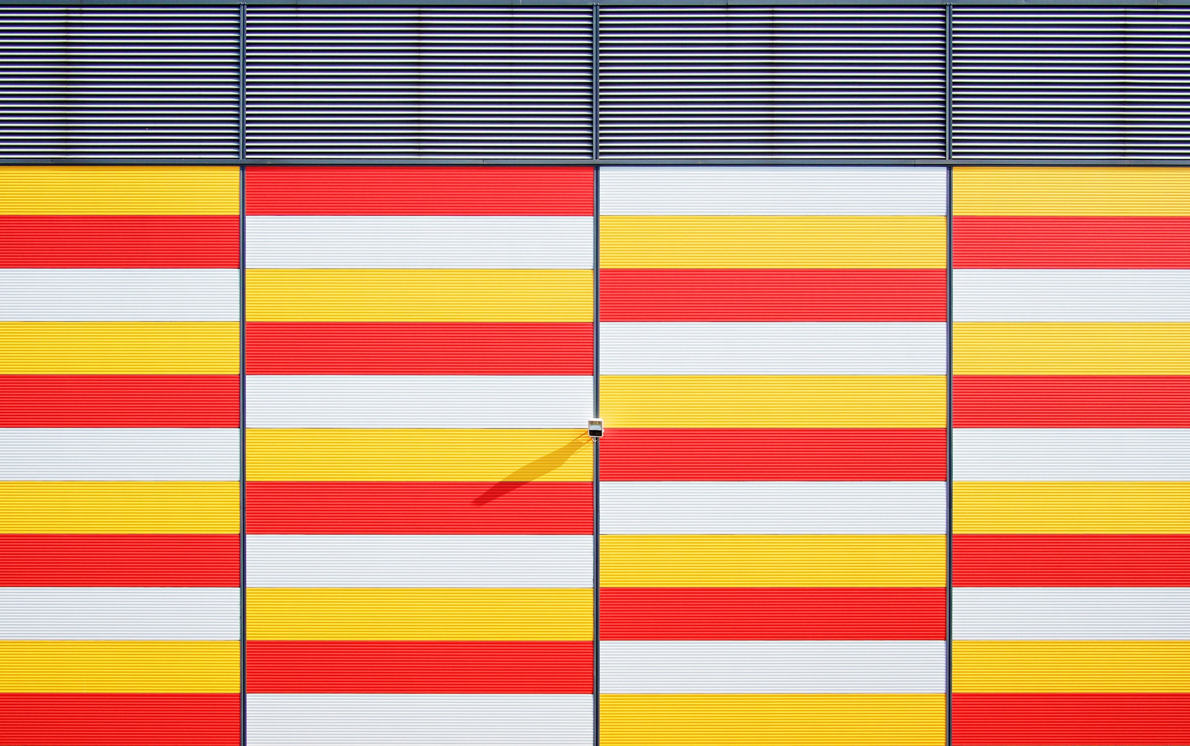 red, yellow, and white bars arranged in a pattern