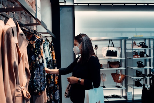 A customer shopping at a clothing store