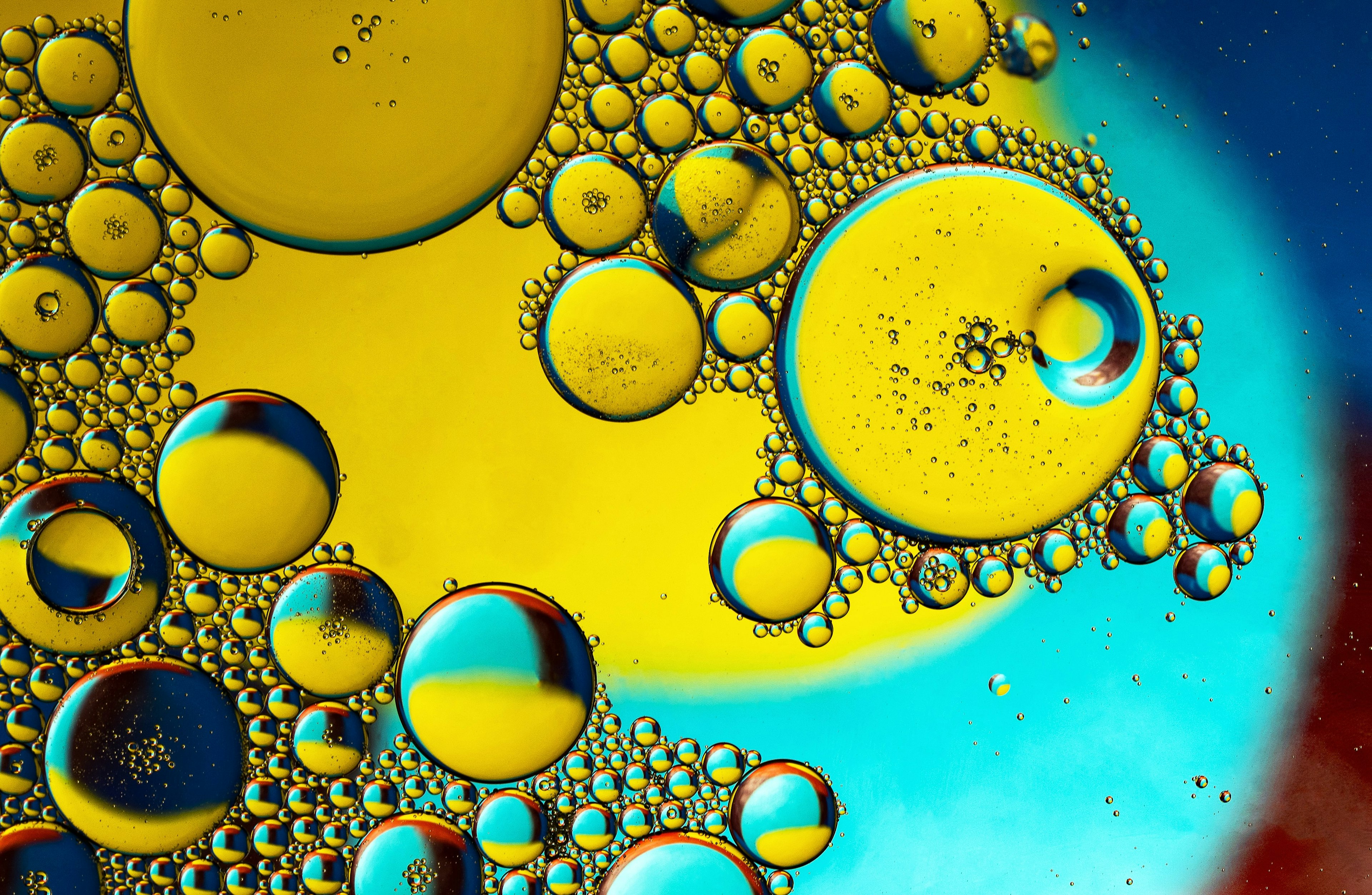 bubbles against a bright blue and yellow background